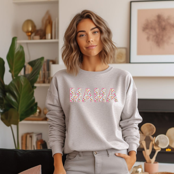 Sweet Floral Mama Graphic Sweatshirt.&nbsp; Perfect for the Girl Mom or just the mom who is girlie!&nbsp; The sweet floral design has a vintage chic and feminine feel.&nbsp; Purchase for yourself or as a gift!&nbsp; Would make a great gift for baby showers, new mom gift, Mother's Day, or just because!