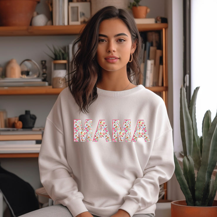 Sweet Floral Mama Graphic Sweatshirt.&nbsp; Perfect for the Girl Mom or just the mom who is girlie!&nbsp; The sweet floral design has a vintage chic and feminine feel.&nbsp; Purchase for yourself or as a gift!&nbsp; Would make a great gift for baby showers, new mom gift, Mother's Day, or just because!