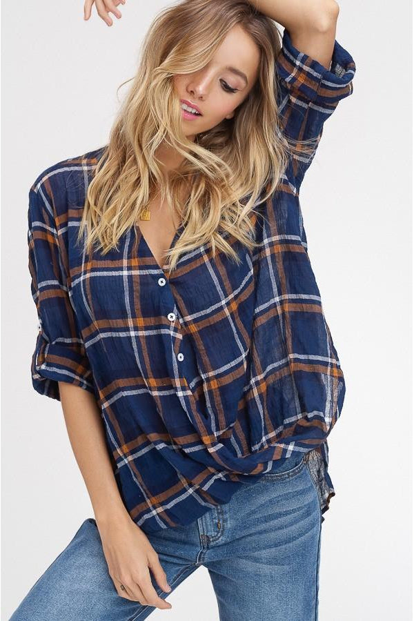 - Checker high low button down gather top - Textured check printed cotton fabric - All over textured striped pattern - Button down in center front - High low cut with gathered front hem - Roll up sleeve cuff strap with button