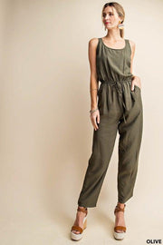 If You've Never Tried A Jumpsuit, Now Is Your Chance!  This Brand Runs So Nice!   Olive is Such A Great Versatile Color  You Can Pair This With a Light Cardigan or Jean Jacket!  Waist String Jumpsuit