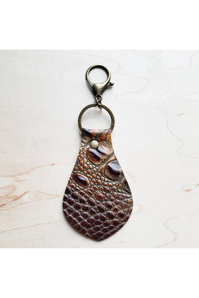 Genuine Leather Handmade 4” in length Embossed Hide Handmade Genuine Leather Key Chain is sourced and made in Texas. Comes with an attached clip