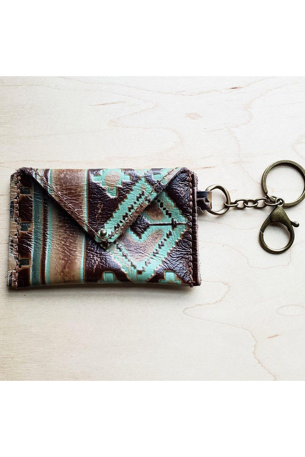 Genuine Leather Handmade 4”x3”  Embossed Hide Handmade Genuine Leather Wallet is sourced and made in Texas. Comes with an attached clip and key ring